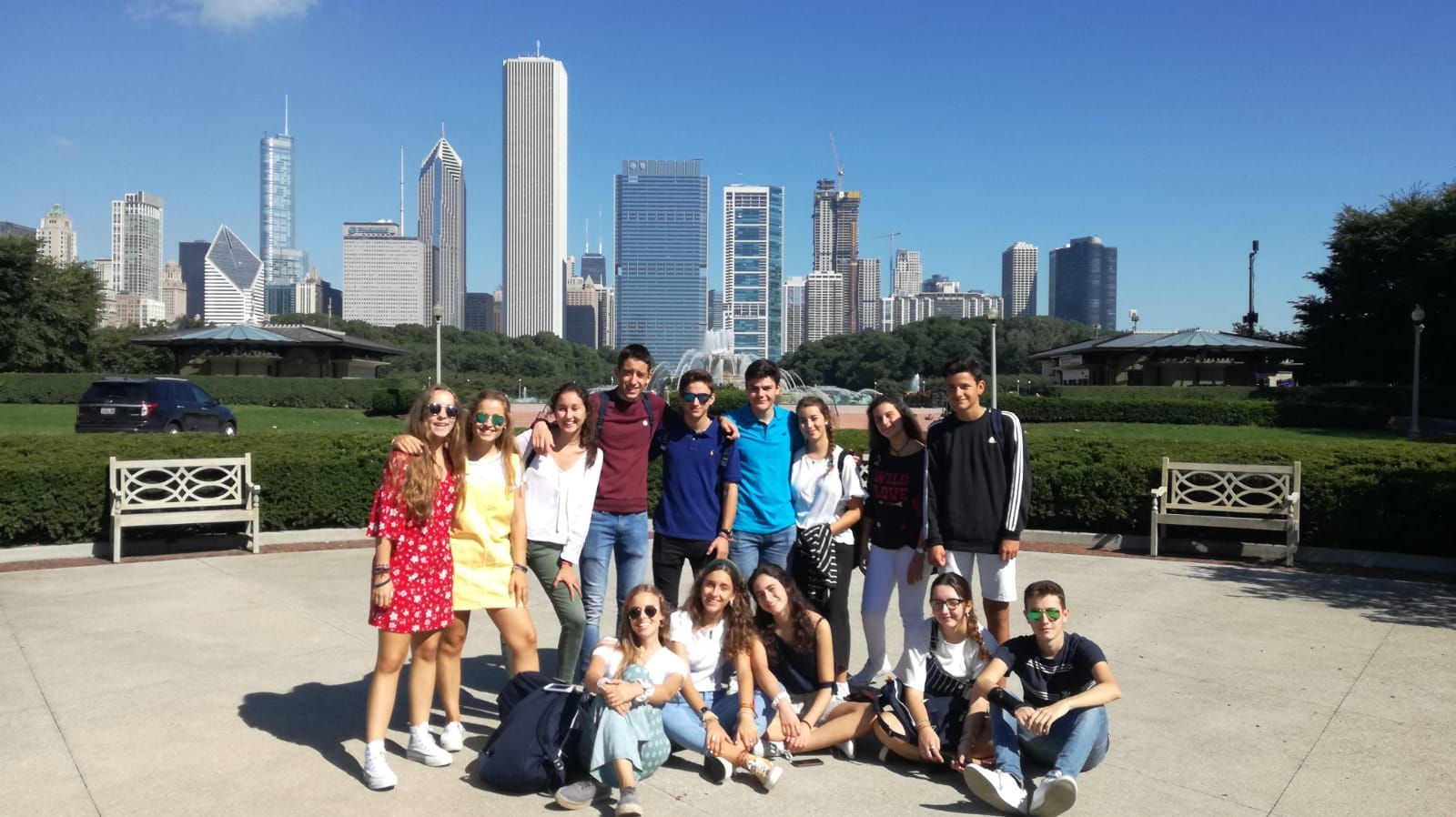An exchange group in front of the Chicago skyline